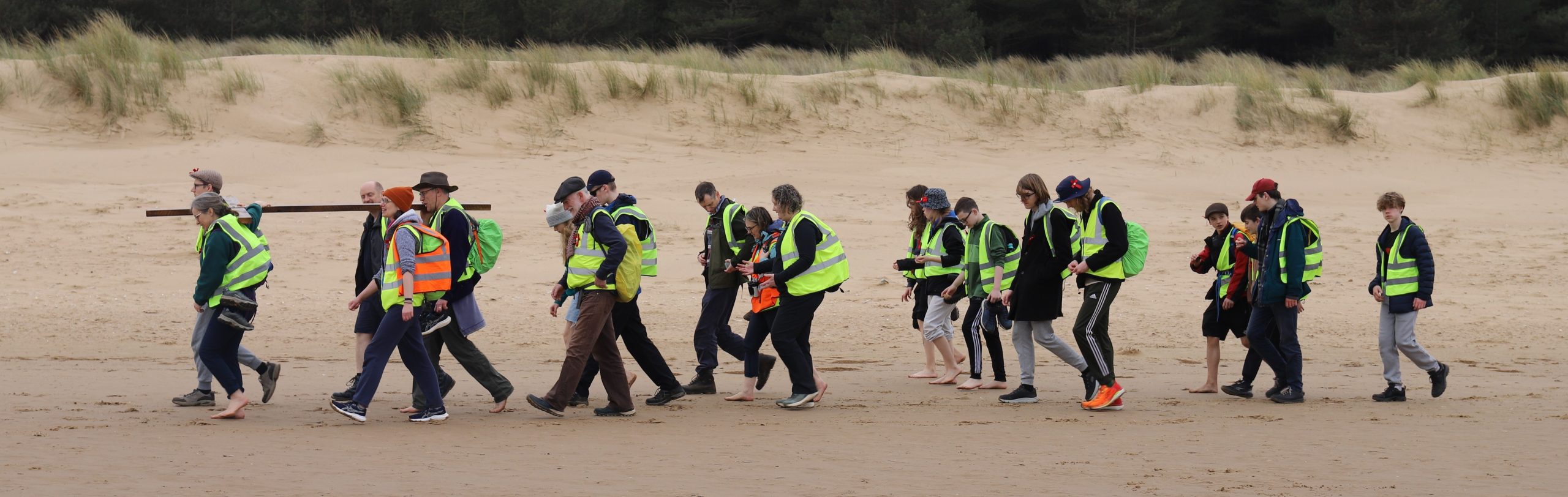Pilgrims walking on the North Norfolk Coastal Path