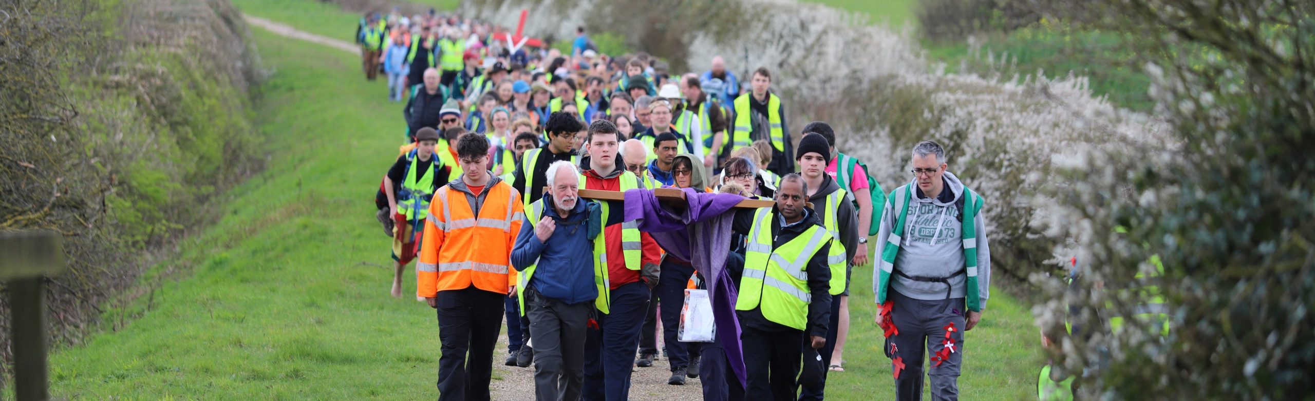 Pilgrims walking the Holy Mile into Walsingham